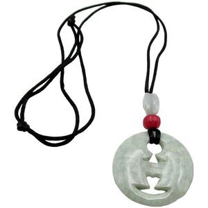 Authentic Jadeite kissing moon pendant necklace on black silk cord.